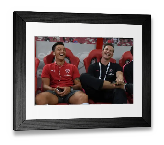 Framed Print : Arsenal's Ozil and Draxler Engage in Pre-Match Chat Ahead of Arsenal vs. Paris Saint-Germain