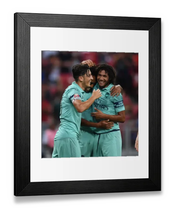 Framed Print : Arsenal's Ozil and Elneny: Celebrating a Goal Against Paris Saint-Germain in the 2018 Pre-Season Friendly