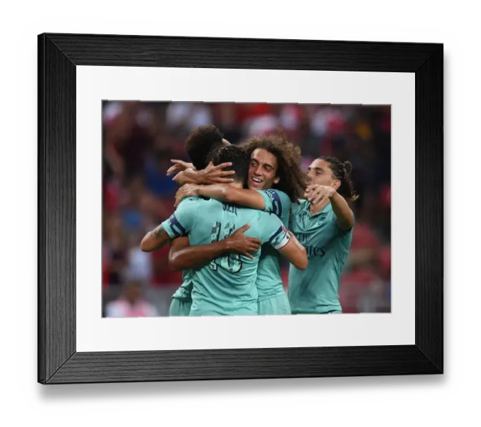 Framed Print : Arsenal's Ozil and Guendouzi: Celebrating a Goal Against Paris Saint-Germain in the 2018 International Champions Cup