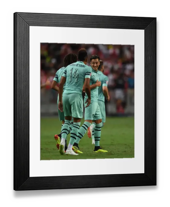 Framed Print : Arsenal Stars Ozil and Aubameyang Celebrate Goal Against Paris Saint-Germain, 2018 Framed Print : Arsenal Stars Ozil and Aubameyang Celebrate Goal Against Paris Saint-Germain, 2018