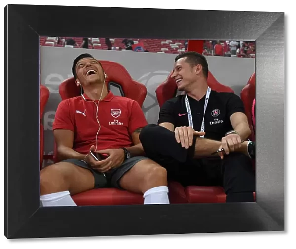 Mesut Ozil and Julian Draxler Share a Moment Before Arsenal vs. Paris Saint-Germain Pre-Season Friendly, 2018