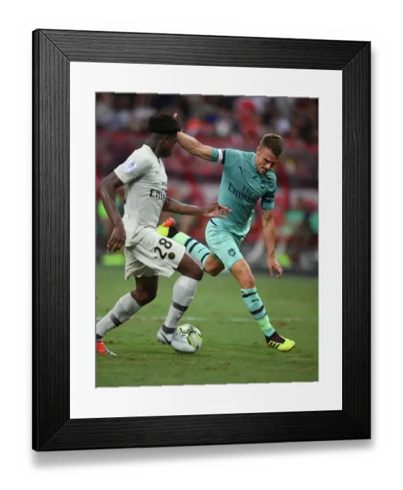 Framed Print : Arsenal's Aaron Ramsey Faces Off Against PSG's Loic Mbe Soh in 2018 International Champions Cup Framed Print : Arsenal's Aaron Ramsey Faces Off Against PSG's Loic Mbe Soh in 2018 International Champions Cup