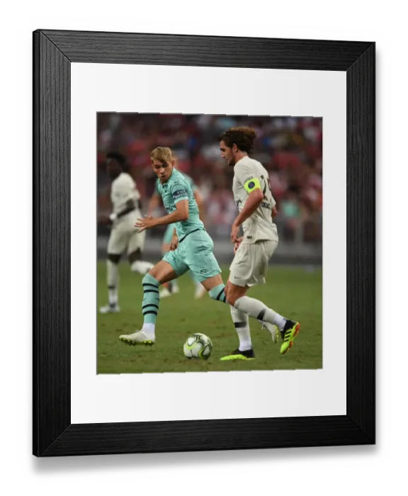 Framed Print : Arsenal's Emile Smith Rowe Clashes with Paris Saint-Germain's Adrien Rabiot in Pre-Season Friendly Framed Print : Arsenal's Emile Smith Rowe Clashes with Paris Saint-Germain's Adrien Rabiot in Pre-Season Friendly