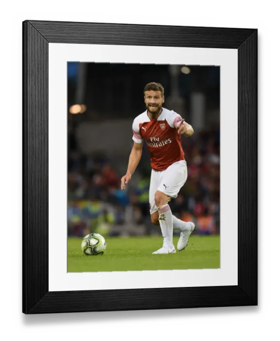 Framed Print : Arsenal's Shkodran Mustafi Faces Off Against Chelsea in 2018 International Champions Cup, Dublin Framed Print : Arsenal's Shkodran Mustafi Faces Off Against Chelsea in 2018 International Champions Cup, Dublin