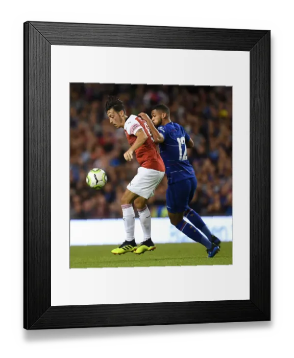 Framed Print : Clash of Midfield Talents: Ozil vs. Loftus-Cheek in Arsenal vs. Chelsea Pre-Season Battle Framed Print : Clash of Midfield Talents: Ozil vs. Loftus-Cheek in Arsenal vs. Chelsea Pre-Season Battle