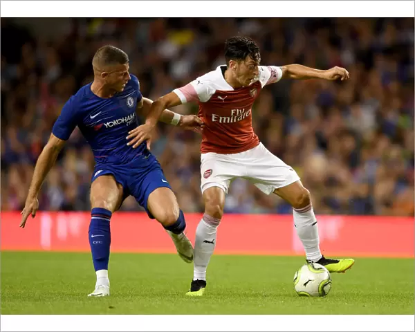 Arsenal's Clash of Talents: Ozil vs. Barkley (2018) - Pre-Season Showdown against Chelsea