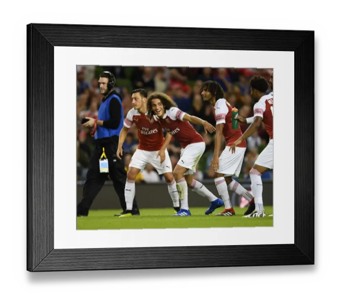 Framed Print : Arsenal's Ozil, Guendouzi, and Elneny Train Together During Arsenal v Chelsea Pre-Season Friendly (2018-19)