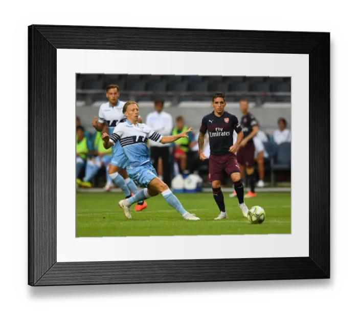 Framed Print : Torreira vs. Leiva: Intense Battle in Arsenal's Pre-Season Clash with Lazio