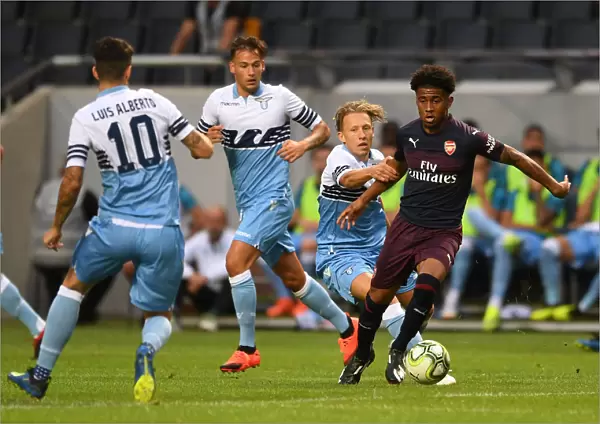 Reiss Nelson Goes Head-to-Head with Luis Alberto and Lucas Leiva in Arsenal's Pre-Season Battle against Lazio