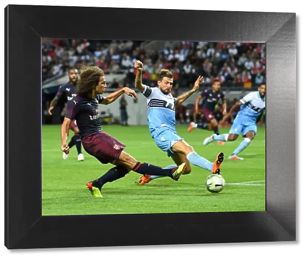 Clash of Midfielders: Guendouzi vs. Acerbi in Arsenal's Pre-Season Battle with Lazio