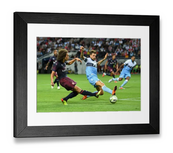 Framed Print : Clash of Midfielders: Guendouzi vs. Acerbi in Arsenal's Pre-Season Battle with Lazio Framed Print : Clash of Midfielders: Guendouzi vs. Acerbi in Arsenal's Pre-Season Battle with Lazio