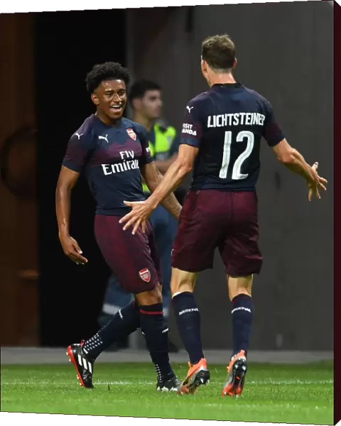 Arsenal's Reiss Nelson and Stephan Lichtsteiner Celebrate Goal Against SS Lazio in Stockholm Pre-Season Friendly, 2018