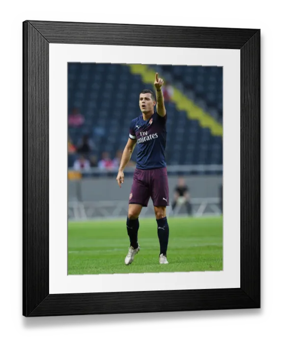Framed Print : Granit Xhaka in Action: Arsenal vs SS Lazio, Stockholm 2018 Framed Print : Granit Xhaka in Action: Arsenal vs SS Lazio, Stockholm 2018