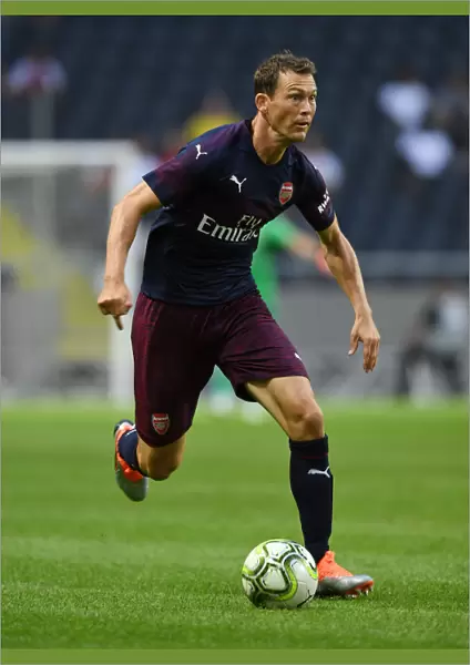 Arsenal's Stephan Lichtsteiner in Action Against SS Lazio, 2018: A Pre-Season Clash in Stockholm