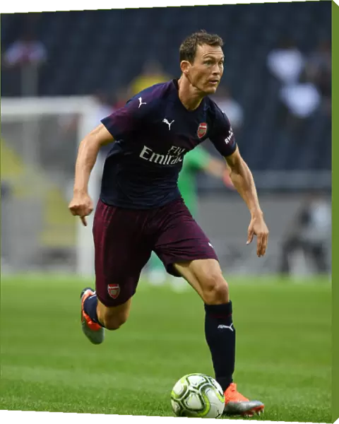 Arsenal's Stephan Lichtsteiner in Action Against SS Lazio, 2018: A Pre-Season Clash in Stockholm
