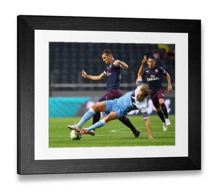 Framed Print : Xhaka vs. Levia: Clash in Arsenal's Pre-Season Battle Against Lazio Framed Print : Xhaka vs. Levia: Clash in Arsenal's Pre-Season Battle Against Lazio