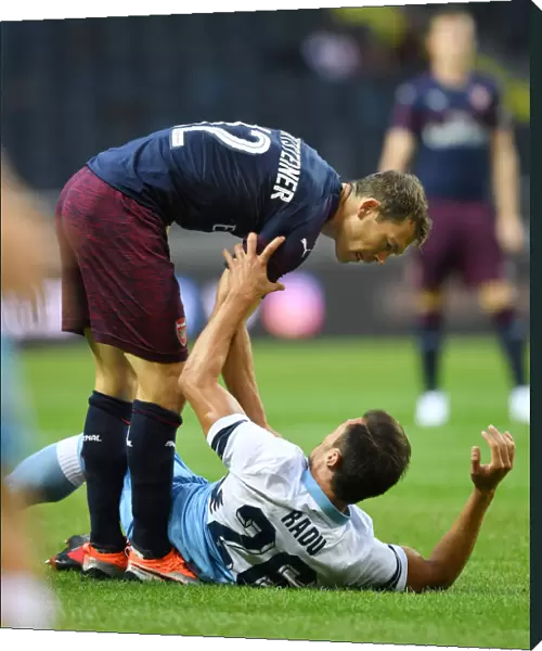 Clash of Titans: Lichtsteiner vs. Radu in Arsenal's Pre-Season Battle with SS Lazio
