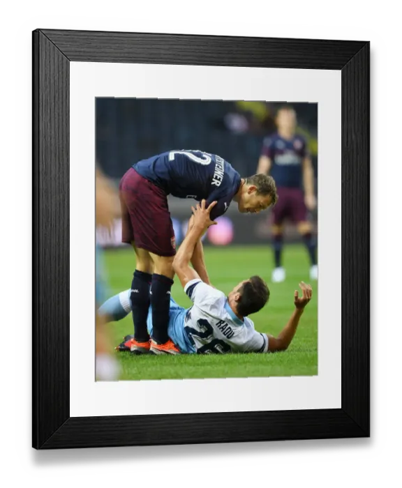 Framed Print : Clash of Titans: Lichtsteiner vs. Radu in Arsenal's Pre-Season Battle with SS Lazio Framed Print : Clash of Titans: Lichtsteiner vs. Radu in Arsenal's Pre-Season Battle with SS Lazio