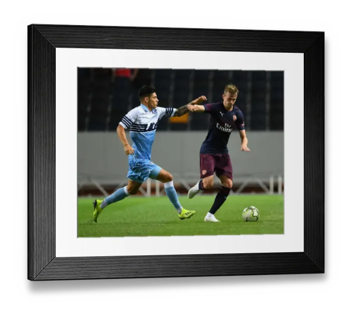 Framed Print : Arsenal's Rob Holding Outmaneuvers Lazio's Joaquim Correa in Stockholm Pre-Season Clash Framed Print : Arsenal's Rob Holding Outmaneuvers Lazio's Joaquim Correa in Stockholm Pre-Season Clash