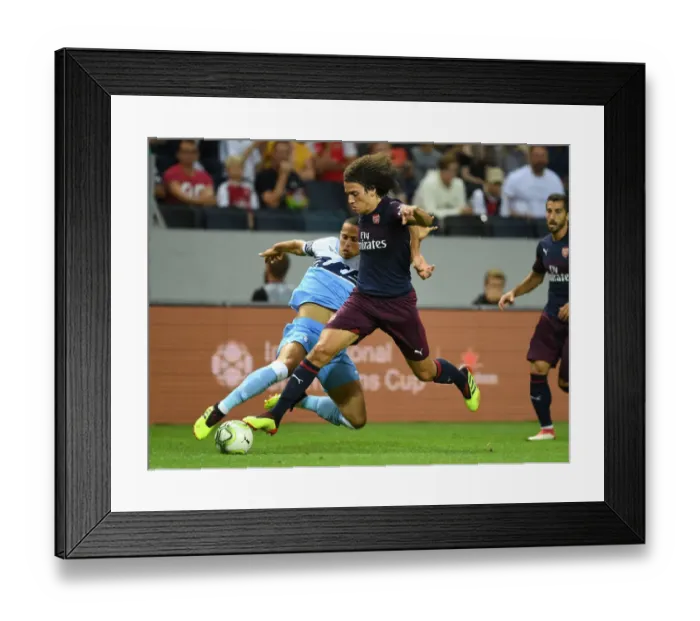 Framed Print : Arsenal's Matteo Guendouzi Overpowers Lazio's Luiz Felipe in Stockholm Friendly