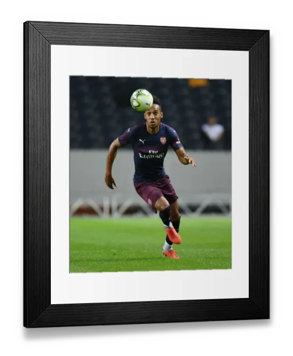 Framed Print : Arsenal's Aubameyang in Action Against SS Lazio (2018)