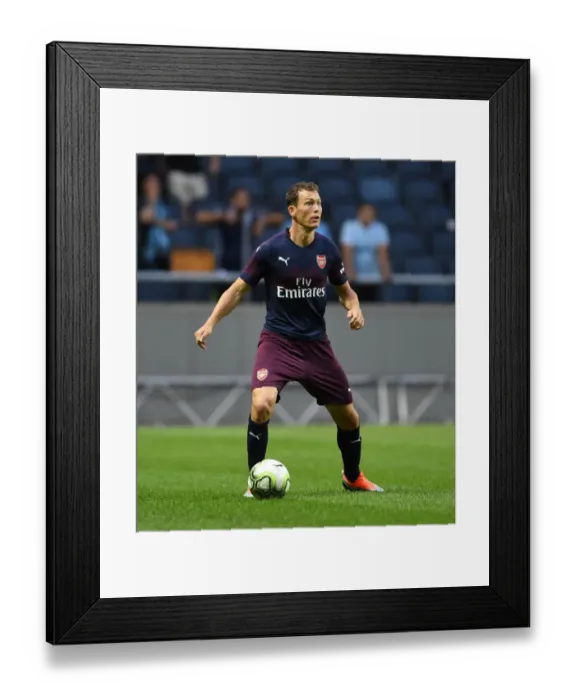 Framed Print : Arsenal's Stephan Lichtsteiner in Action Against SS Lazio: Pre-Season Clash in Stockholm, 2018 Framed Print : Arsenal's Stephan Lichtsteiner in Action Against SS Lazio: Pre-Season Clash in Stockholm, 2018