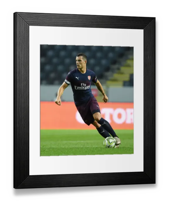 Framed Print : STOCKHOLM, SWEDEN - AUGUST 04: Granit Xhak of Arsenal during the Pre-season friendly between Arsenal Framed Print : STOCKHOLM, SWEDEN - AUGUST 04: Granit Xhak of Arsenal during the Pre-season friendly between Arsenal