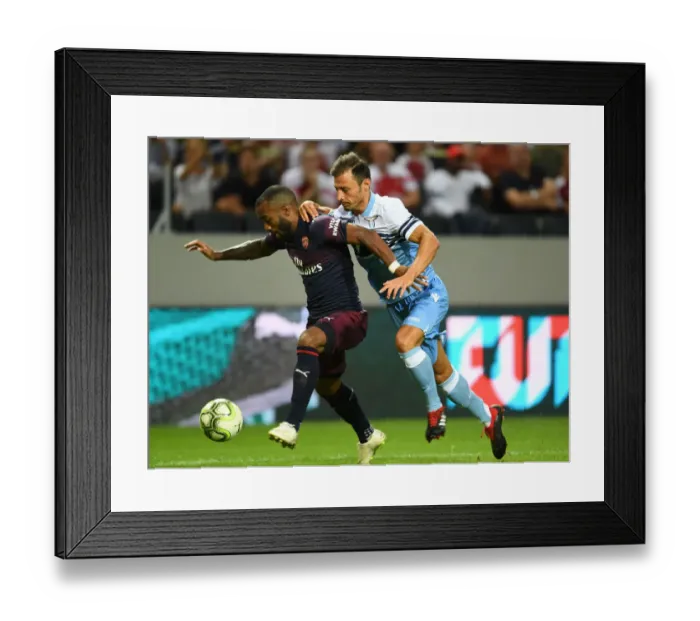 Framed Print : Clash in Stockholm: Alex Lacazette vs Stefan Radu - Arsenal vs SS Lazio Pre-Season Friendly Framed Print : Clash in Stockholm: Alex Lacazette vs Stefan Radu - Arsenal vs SS Lazio Pre-Season Friendly