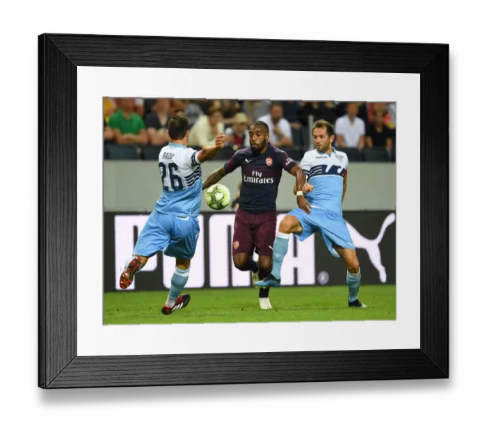 Framed Print : Clash in Stockholm: Lacazette Faces Off Against Radu and Lulic in Arsenal vs. Lazio Pre-Season Friendly Framed Print : Clash in Stockholm: Lacazette Faces Off Against Radu and Lulic in Arsenal vs. Lazio Pre-Season Friendly