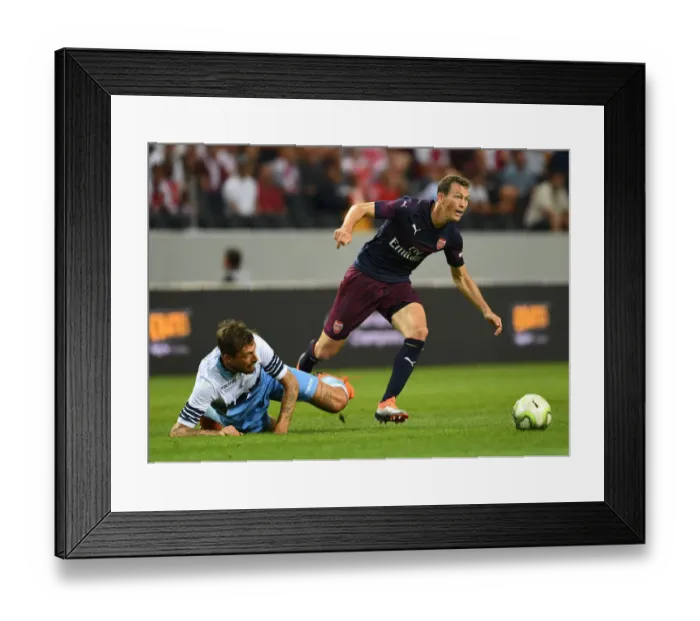 Framed Print : Arsenal's Stephan Lichtsteiner Clashes with Lazio's Francesco Acerbi in Pre-Season Friendly
