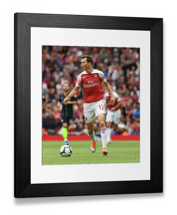 Framed Print : Arsenal's Stephan Lichtsteiner in Action Against Manchester City (2018-19) Framed Print : Arsenal's Stephan Lichtsteiner in Action Against Manchester City (2018-19)