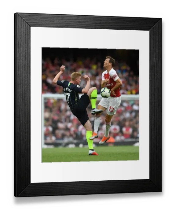 Framed Print : Lichtsteiner vs De Bruyne: A Premier League Showdown at the Emirates
