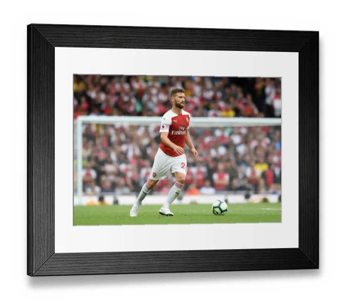 Framed Print : Shkodran Mustafi Focuses in Arsenal's Battle Against Manchester City (2018-19)