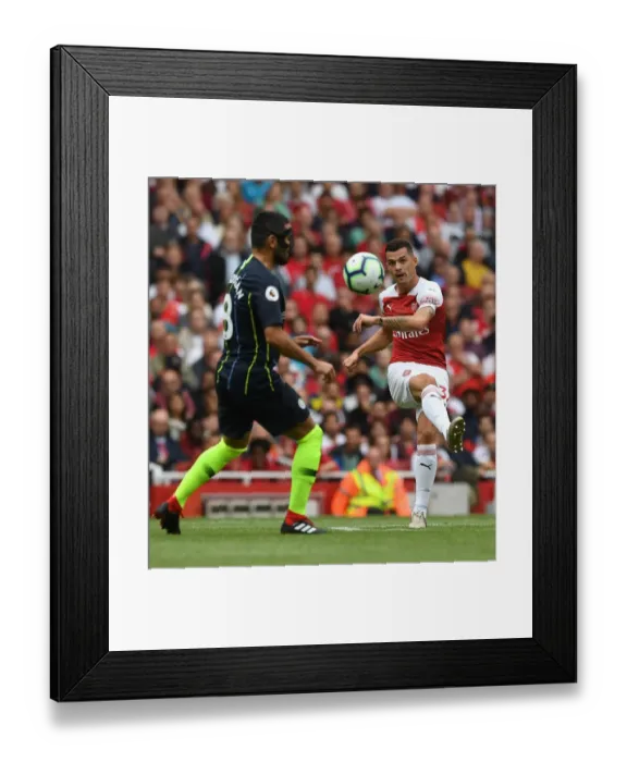 Framed Print : Granit Xhaka in Action: Arsenal vs Manchester City, Premier League 2018-19 Framed Print : Granit Xhaka in Action: Arsenal vs Manchester City, Premier League 2018-19