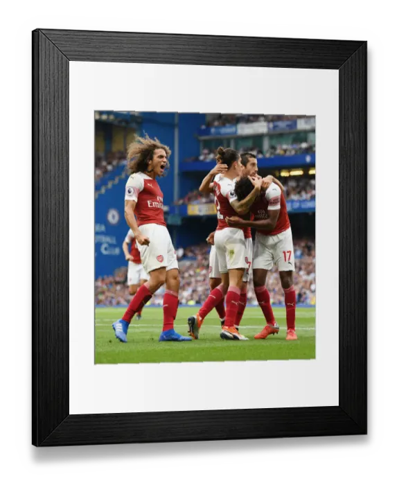Framed Print : Guendouzi and Iwobi Celebrate Arsenal's Winning Goals Against Chelsea (2018-19)