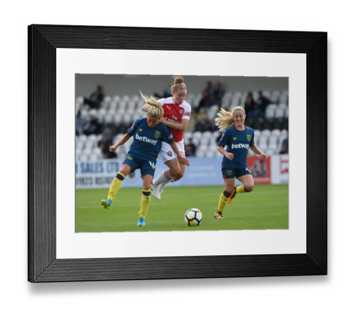 Framed Print : Clash of Stars: Kim Little vs. West Ham Defenders - A Football Battle Framed Print : Clash of Stars: Kim Little vs. West Ham Defenders - A Football Battle