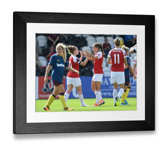 Framed Print : Arsenal Women's Dominance: McCabe and Little Celebrate Third Goal Against West Ham United Framed Print : Arsenal Women's Dominance: McCabe and Little Celebrate Third Goal Against West Ham United