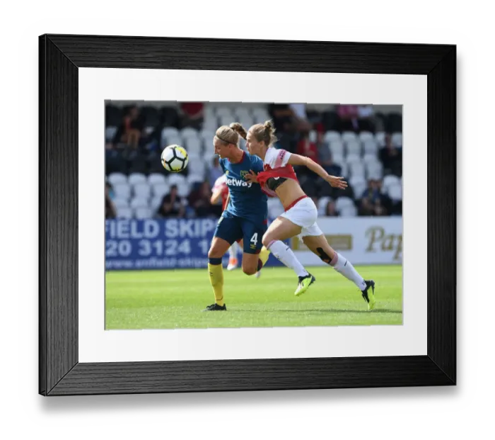 Framed Print : Arsenal's Vivianne Miedema Clashes with West Ham's Brooke Hendrix in Continental Cup Match