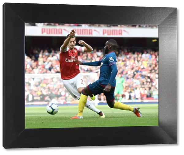 Clash at the Emirates: Mkhitaryan vs Masuaku in Arsenal's Battle Against West Ham