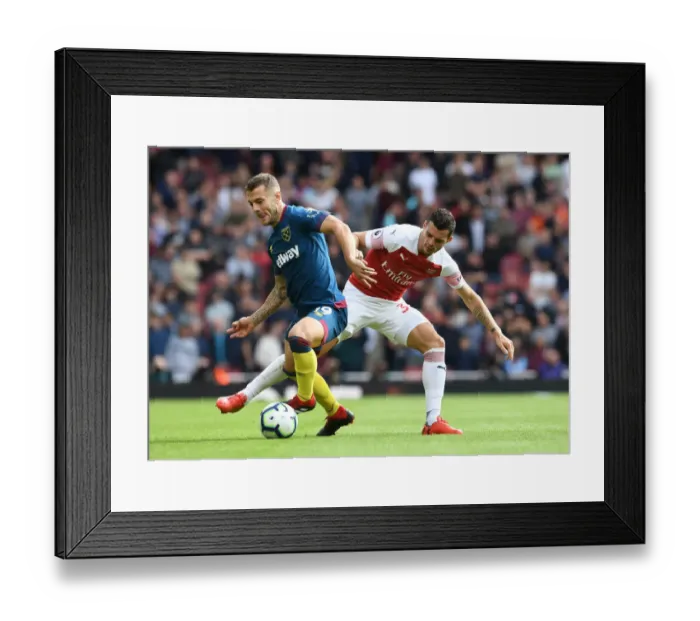 Framed Print : Clash of Midfield Titans: Xhaka vs. Wilshere - Arsenal vs. West Ham (2018-19)