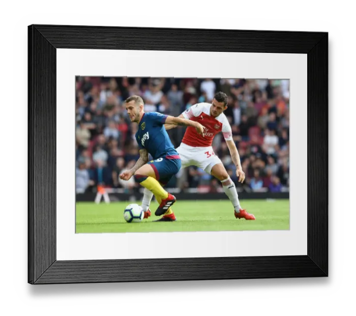 Framed Print : Clash of Midfield Titans: Xhaka vs. Wilshere - Arsenal vs. West Ham (2018-19)