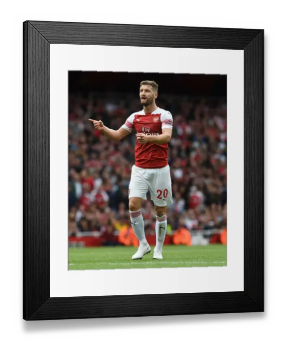 Framed Print : Shkodran Mustafi Focuses in Arsenal's Battle Against West Ham United Framed Print : Shkodran Mustafi Focuses in Arsenal's Battle Against West Ham United
