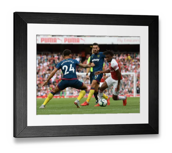 Framed Print : Arsenal's Alex Iwobi Clashes with West Ham's Snodgrass and Fredericks Framed Print : Arsenal's Alex Iwobi Clashes with West Ham's Snodgrass and Fredericks