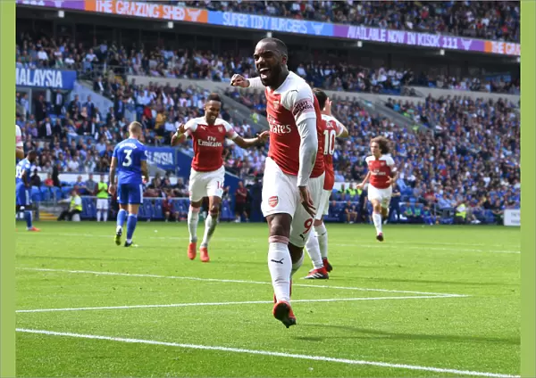 Arsenal Strikers Alexis Lacazette and Pierre-Emerick Aubameyang in Unison: Celebrating Goals against Cardiff City, 2018-19