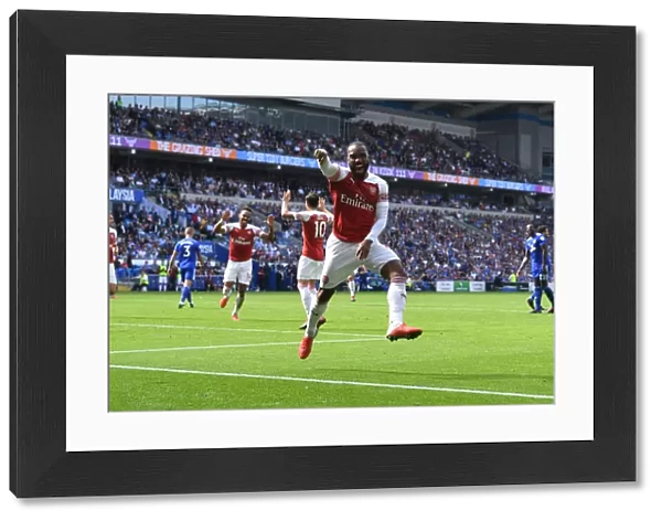 Arsenal Strikers Lacazette and Aubameyang Celebrate Goal Scoring Partnership in Premier League Match against Cardiff City