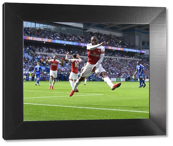 Arsenal Strikers Alexis Lacazette and Pierre-EMerkick Aubameyang Celebrate Goals in Unison during Premier League Match against Cardiff City, 2018-19