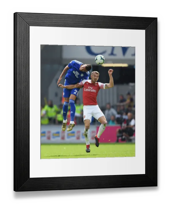 Framed Print : Clash at the Cardiff City Stadium: Aaron Ramsey vs. Victor Camarasa Framed Print : Clash at the Cardiff City Stadium: Aaron Ramsey vs. Victor Camarasa