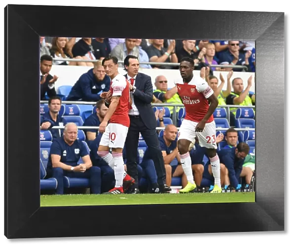 Unai Emery with Mesut Ozil and Danny Welbeck: Arsenal's Duo Shine in Cardiff City Showdown (2018-19)