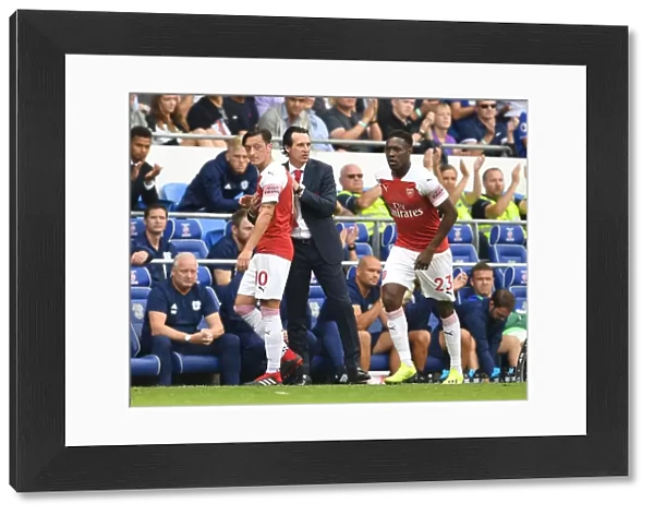 Unai Emery with Mesut Ozil and Danny Welbeck: Arsenal's Duo Shine in Cardiff City Showdown (2018-19)