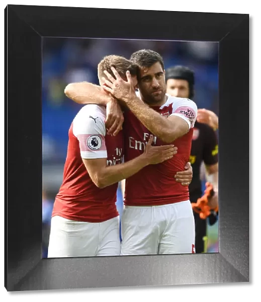 Arsenal's Aaron Ramsey and Sokratis Celebrate Victory Over Cardiff City